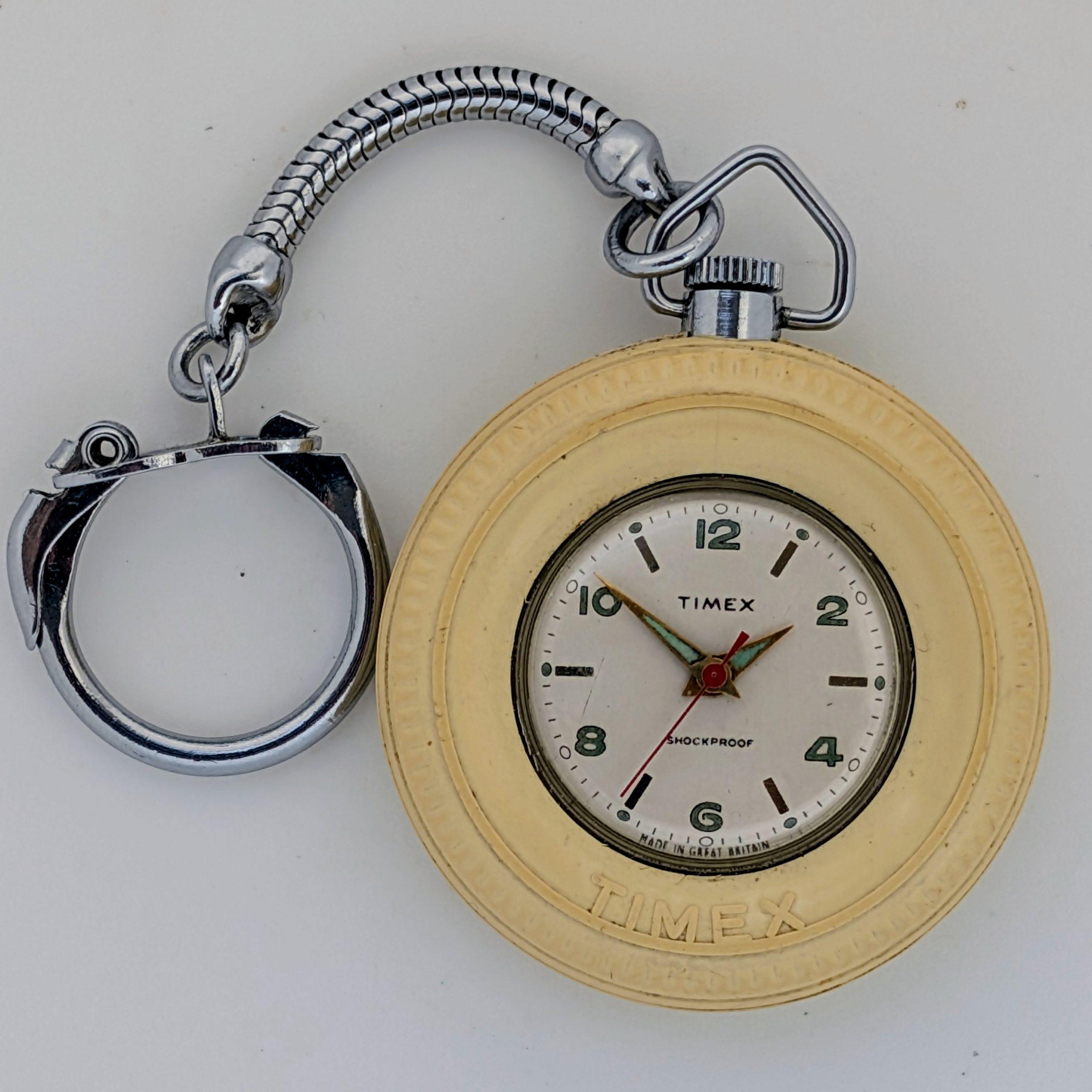 1961 white Timex Key ring Watch Ref. 1917 2261