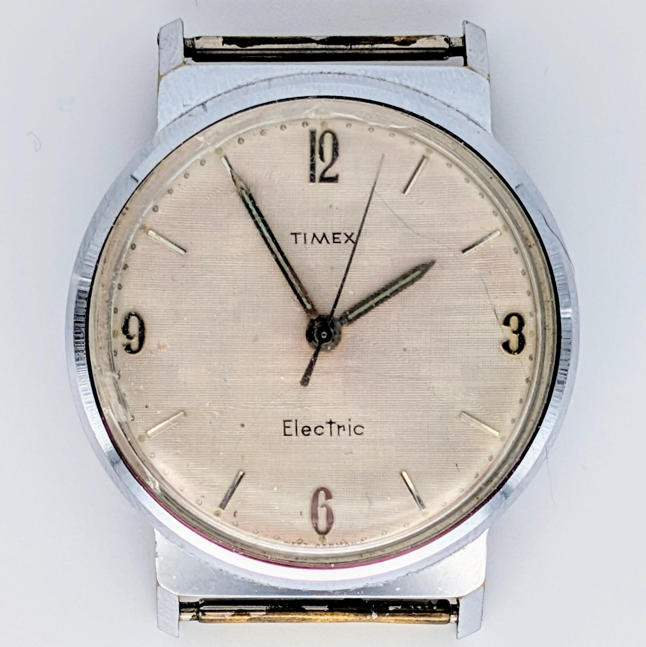 9017 6762 Timex electric EAS linen dial Watch 1962